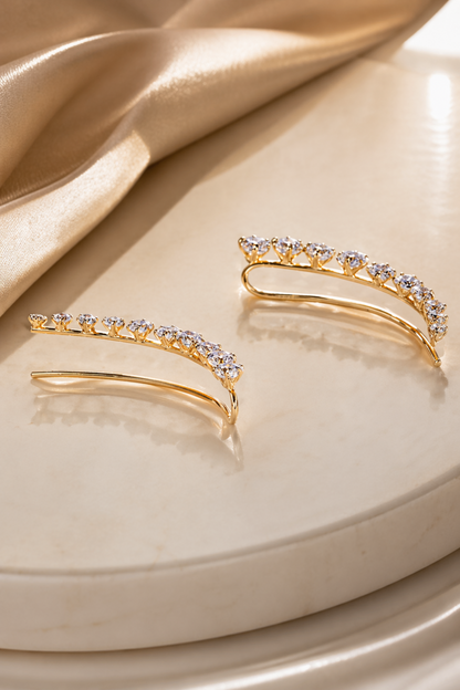 delicate gold ear climber worn on ear

