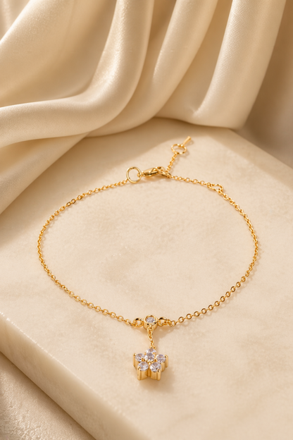 gold anklet with flower charm
