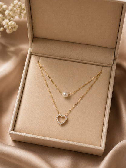 elegant gold necklace with pearl drop detail