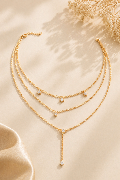 elegant star charm layered necklace close up