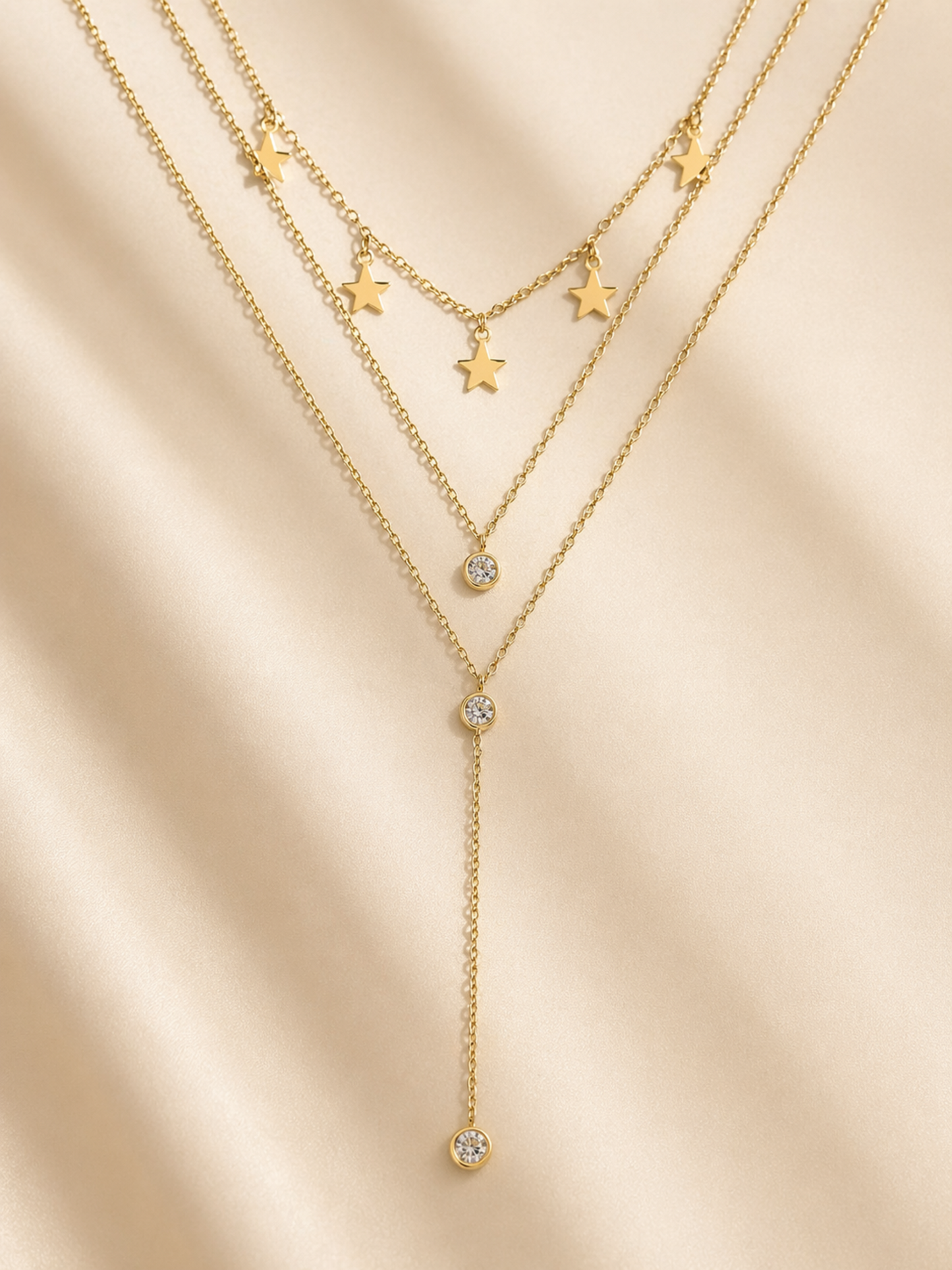 minimalist gold necklace with crystal drop detail