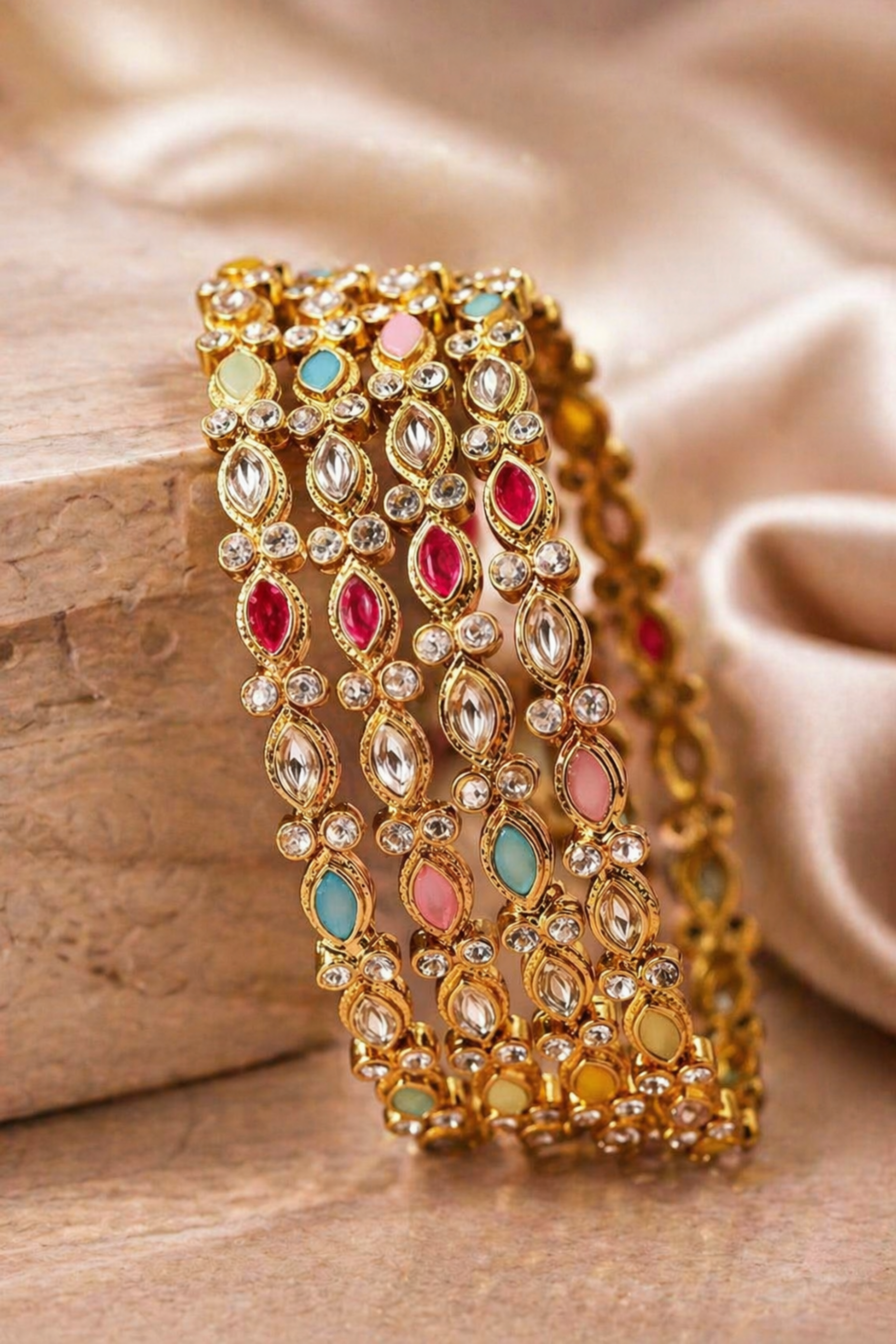 slim gold bracelet with repeating link design
