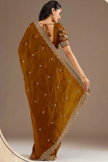 Gold Saree styled for wedding reception evening
