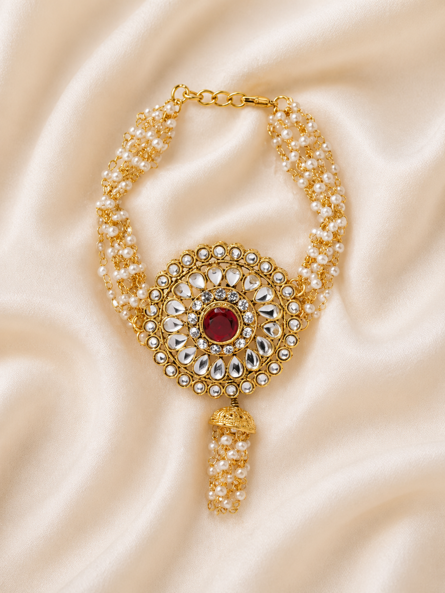 gold tone hand chain bracelet with clear stones