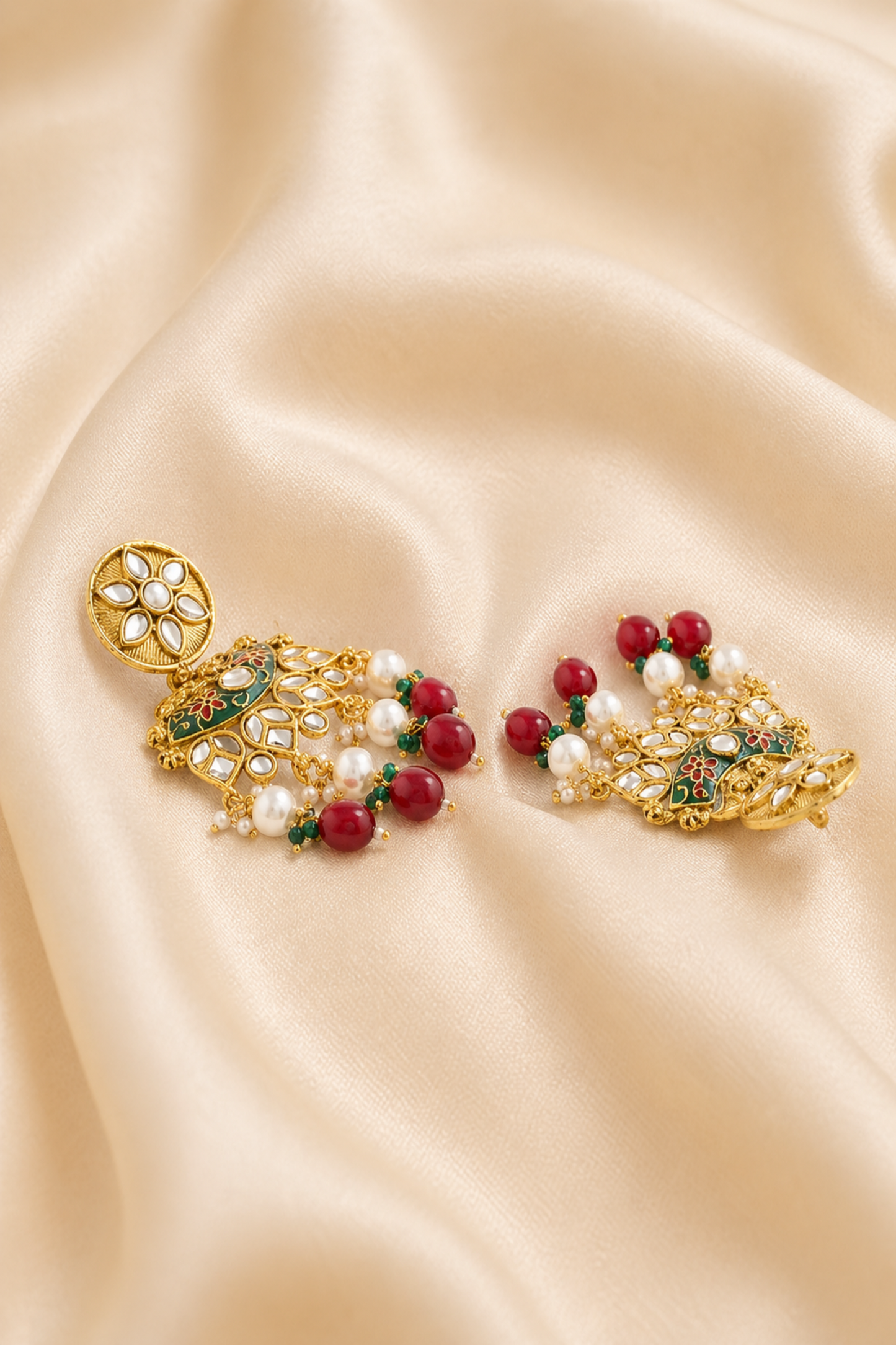 Matching chandelier earrings with red bead accents
