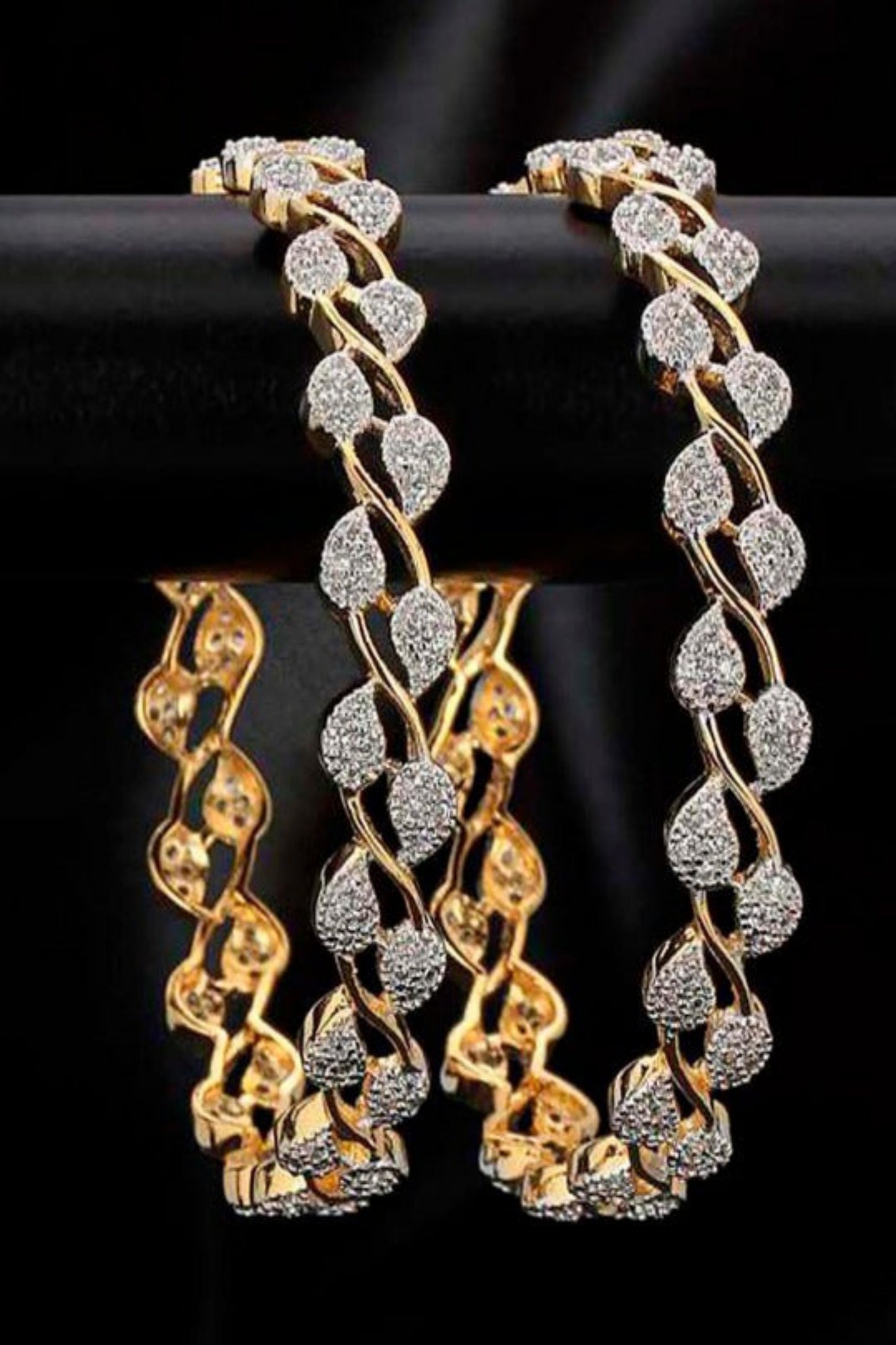 gold-tone bangle set with heart-shaped stone details