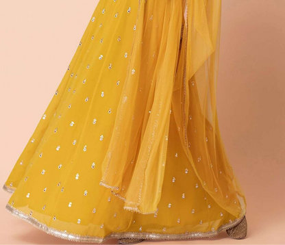 Goldan Yellow Georgette lehenga for wedding celebration