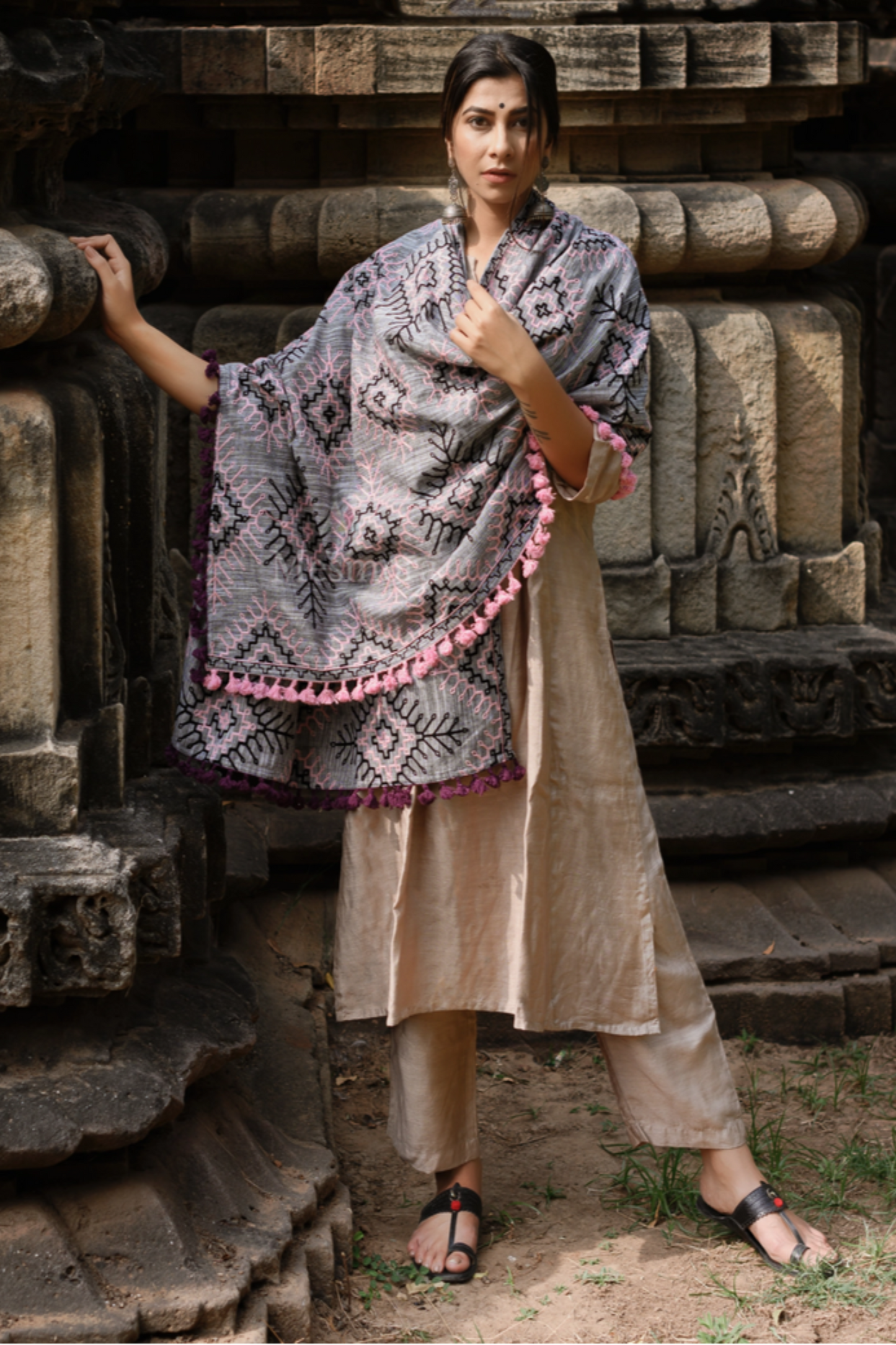 Gray dupatta draped as shawl with fine handcrafted detail