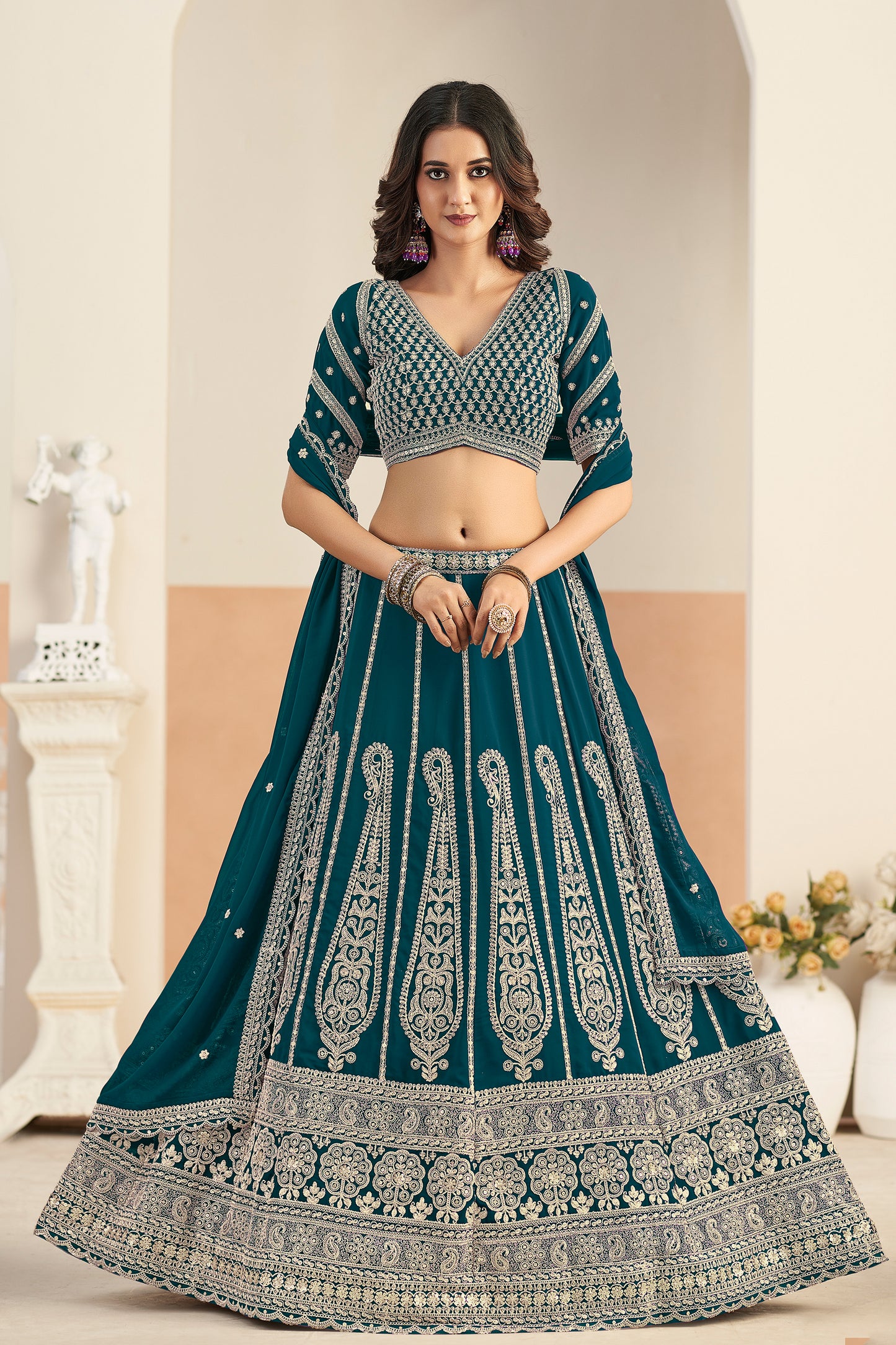 Green lehenga front view with detailed embroidery
