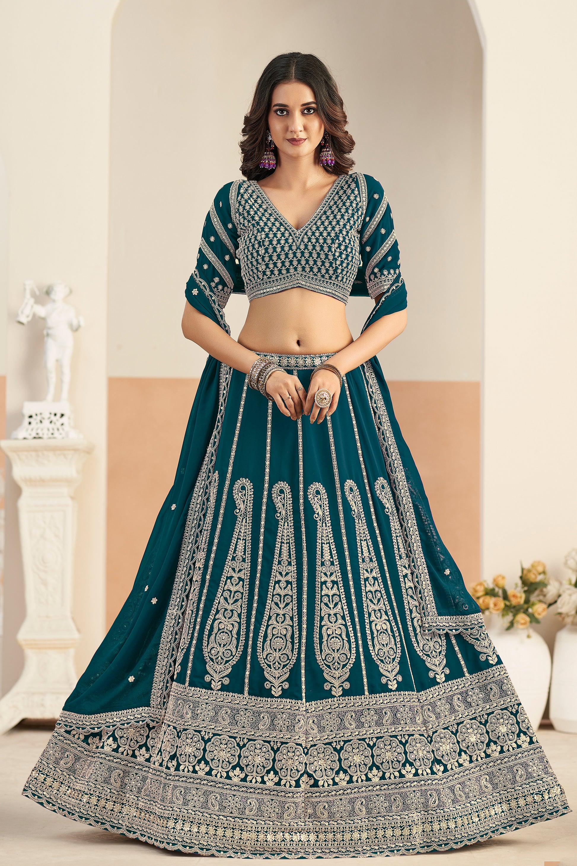 Green lehenga front view with detailed embroidery