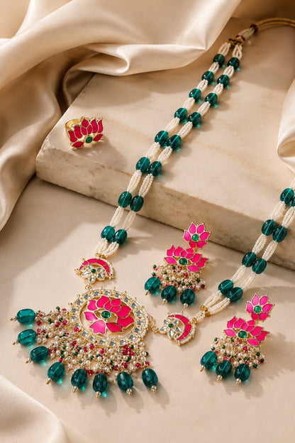 Lotus jewelry set displayed with matching necklace, earrings and statement ring