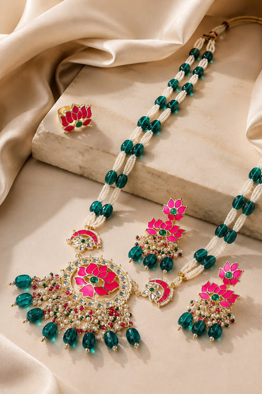 Lotus jewelry set displayed with matching necklace, earrings and statement ring