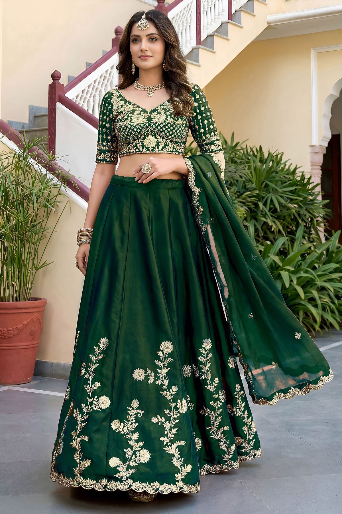 Green embroidered blouse and lehenga front view