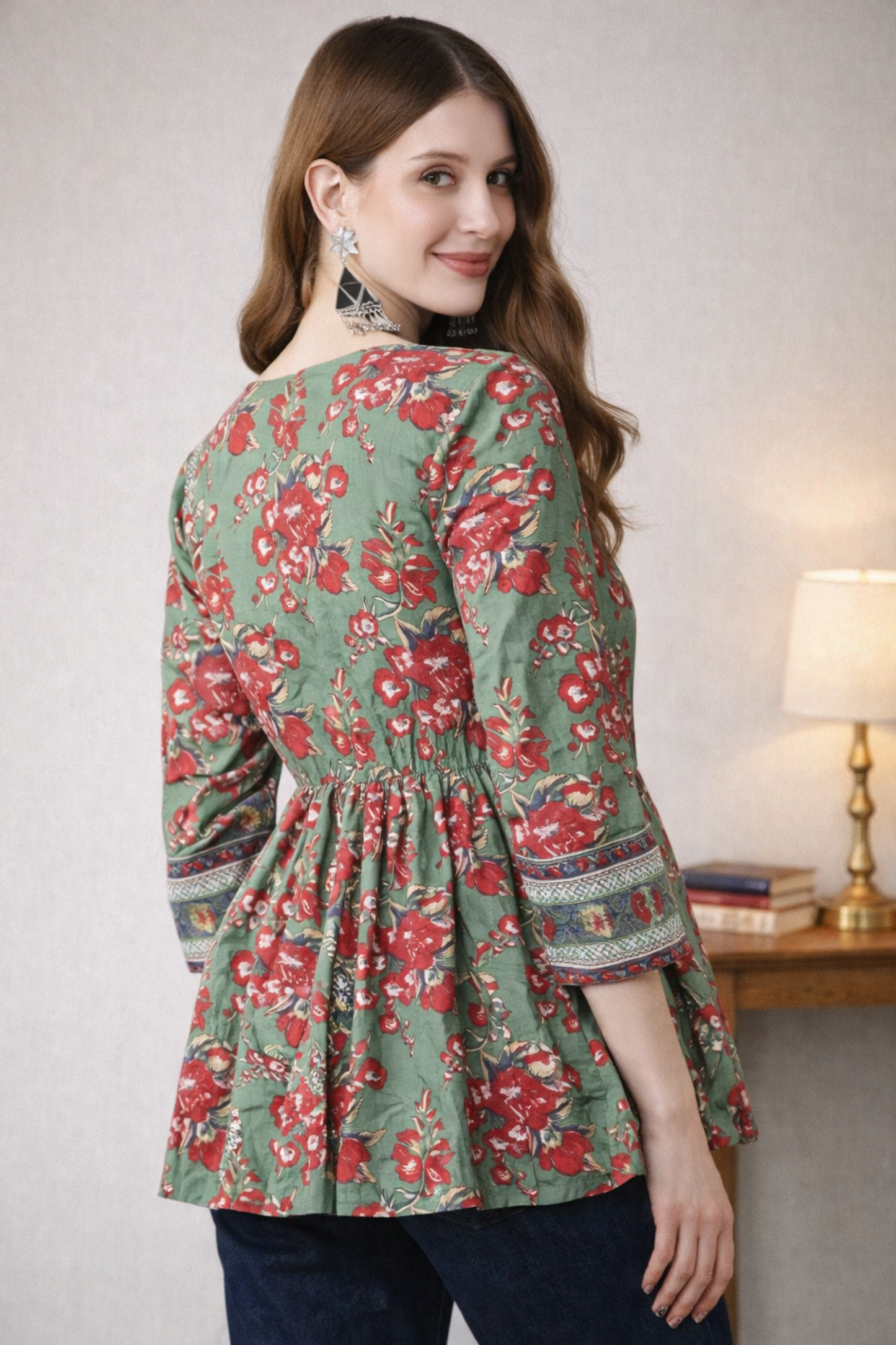 Back view of A-line print top with clean silhouette