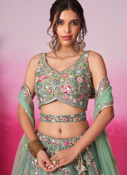 emerald green lehenga choli close-up of foil design
