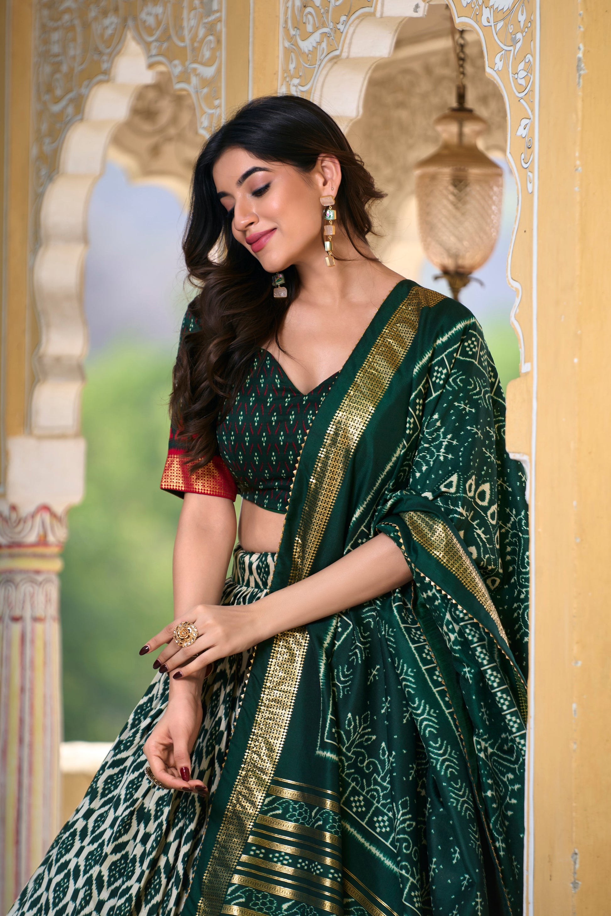 tussar silk lehenga in green color with foil detailing
