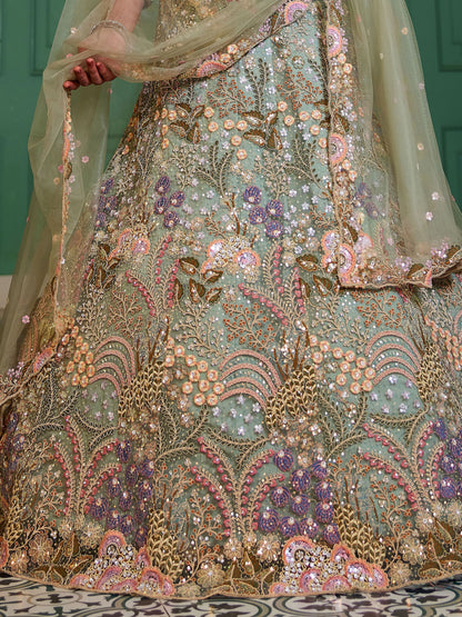 Detailed border design on pistachio green lehenga hem