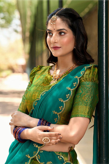 Zari weaving close-up on green lehenga design