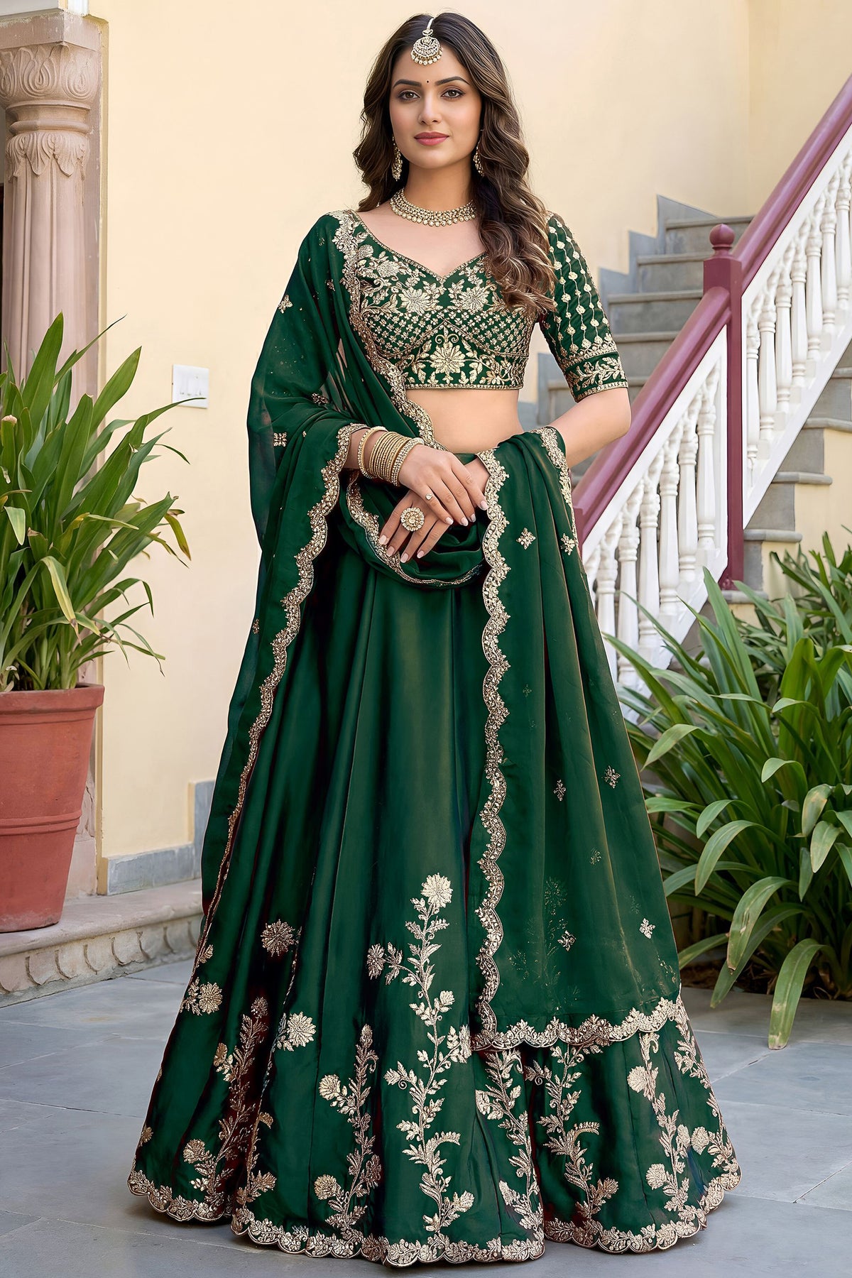Full view of green lengha choli suit with embroidered dupatta