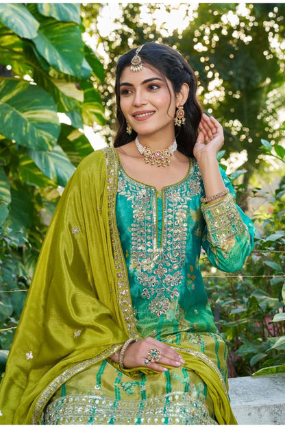 Model wearing Green Palazzo Suit with full back work detail