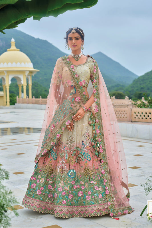 green pink off-white lehenga front view with embroidery