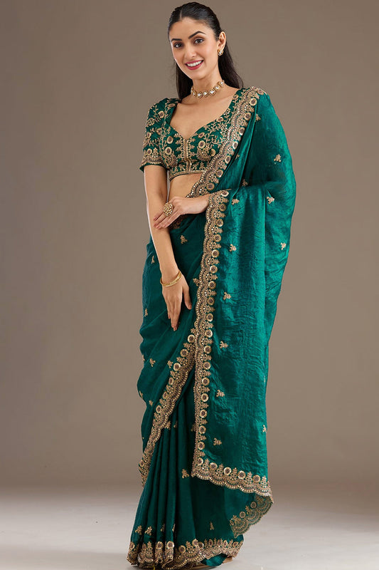 Green Saree with heavy zari and embroidery in royal green silk