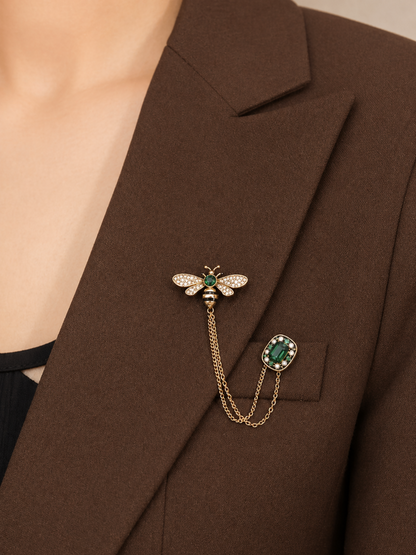 bee shaped brooch on blazer lapel