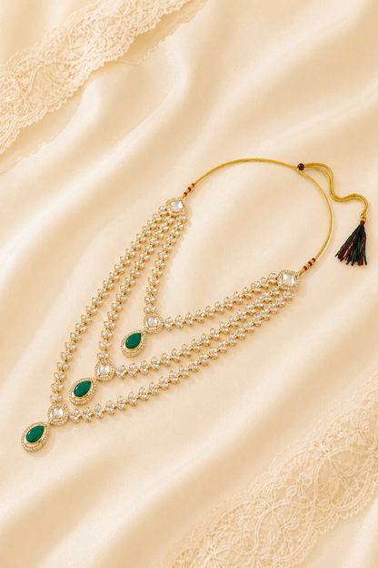 Double layer necklace set displayed on cream fabric