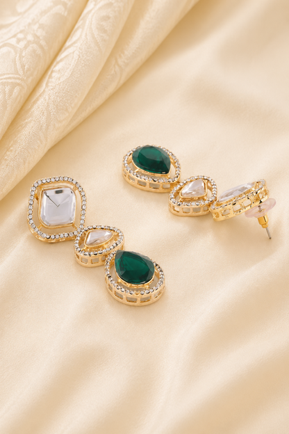 Detailed view of green stone pendant framed by clear stones