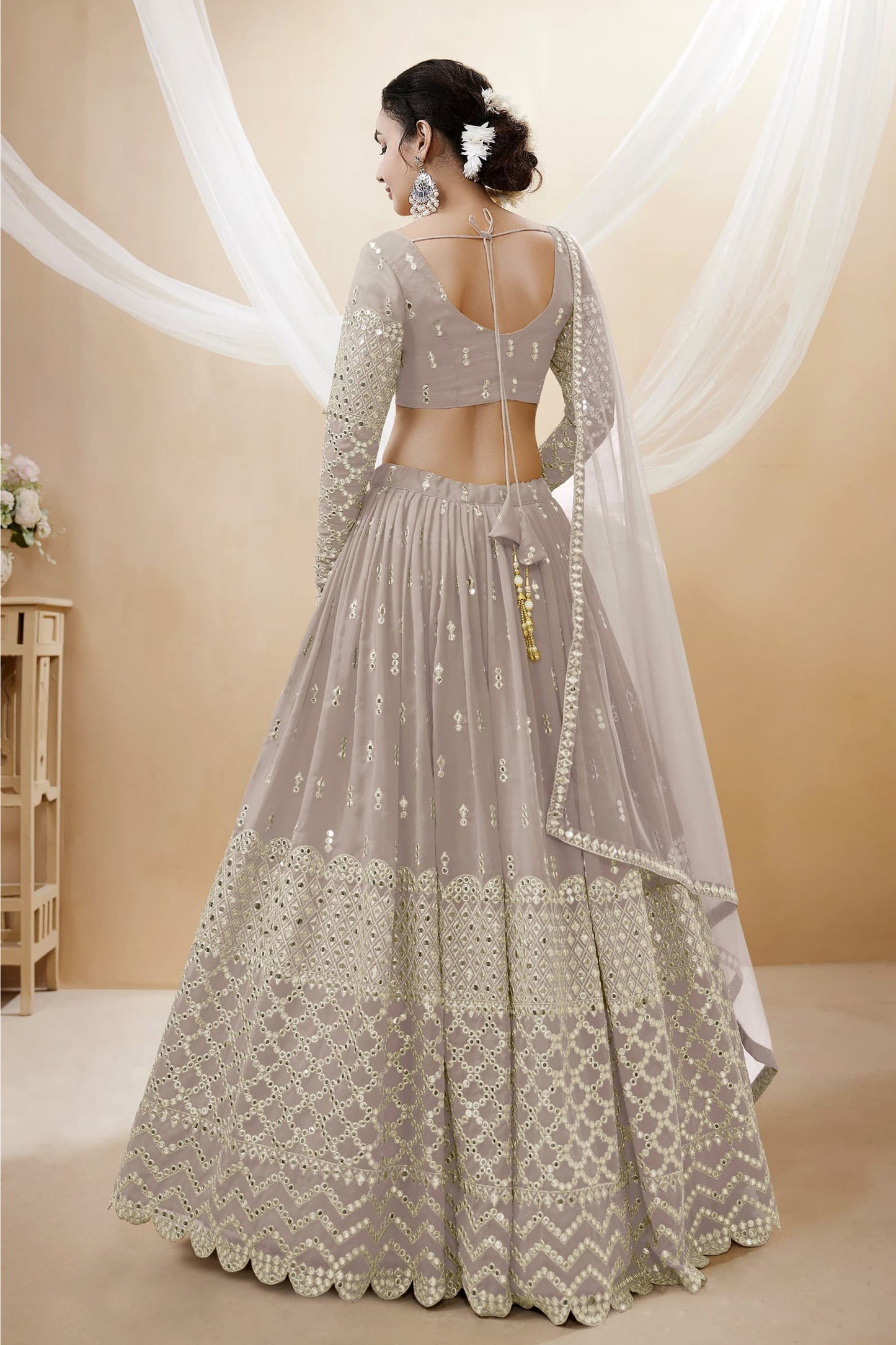 Back design of grey lehenga choli with sequins accents