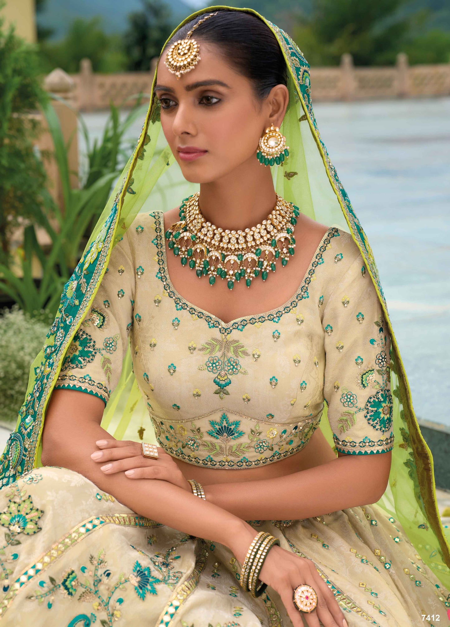 Silk lehenga choli with embroidered detailing close up