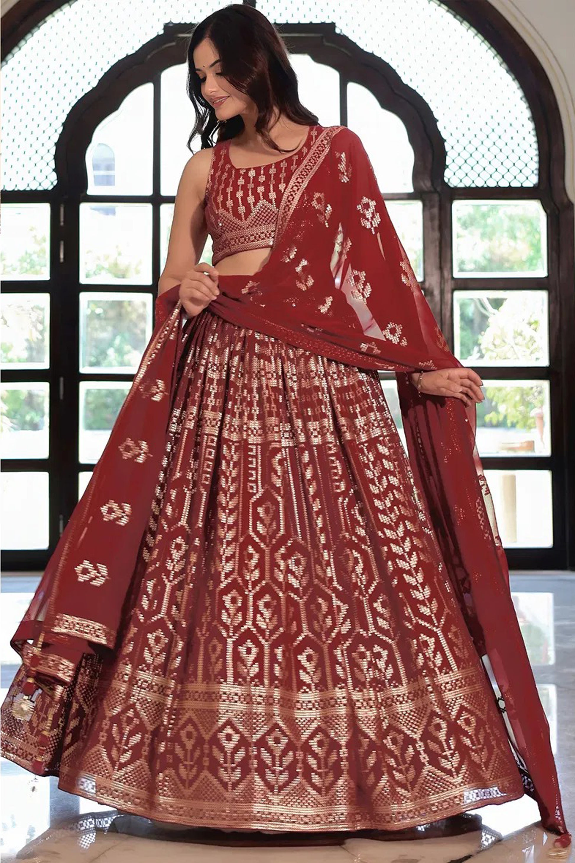 Heavy embroidered lehenga choli in  Maroon for wedding events
