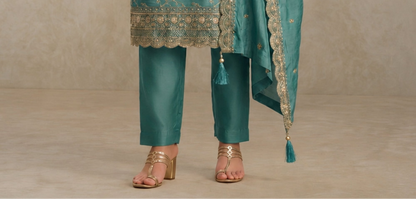 Heavy thread sequin embroidery work on silk kameez fabric