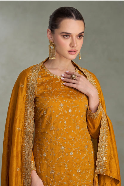Party wear salwar dress in mustard yellow shade