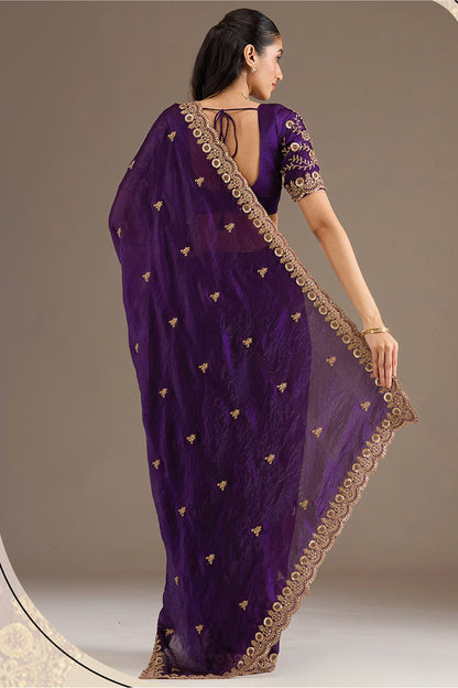 Purple Saree styled for wedding reception evening wear