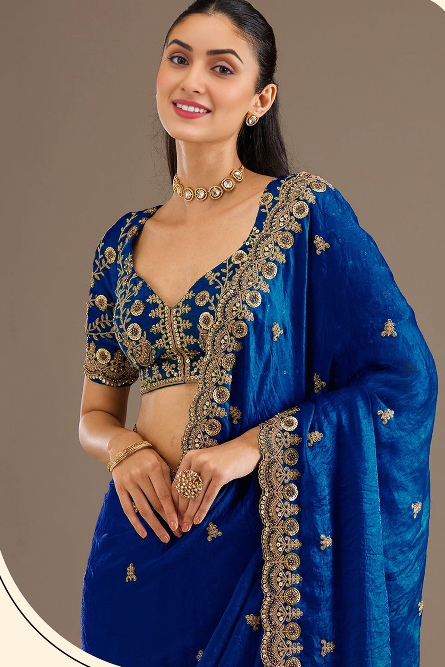 Reception styling look with blue embroidered saree