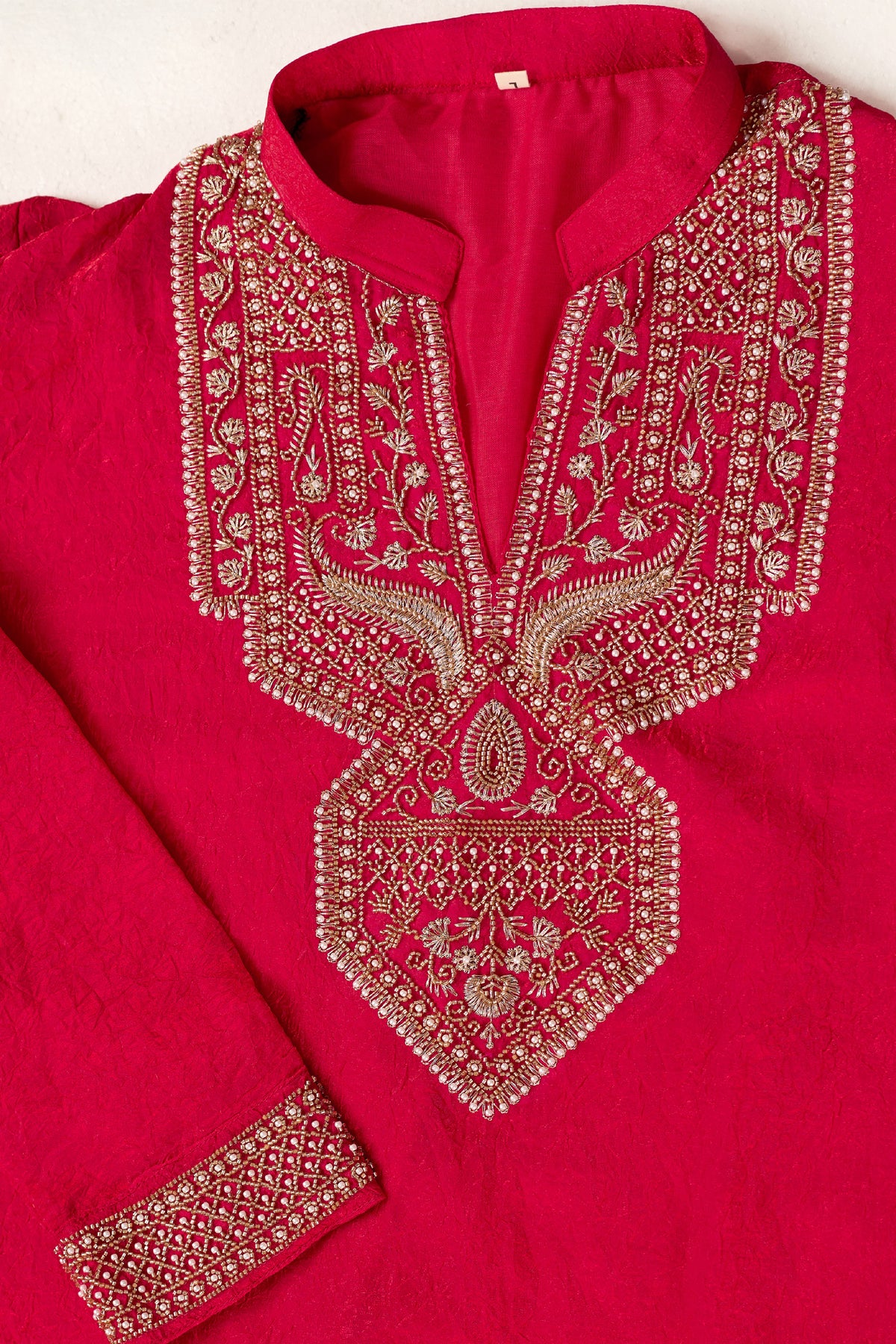 Red kurta hem detail