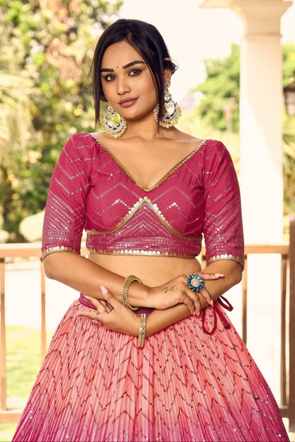Close-up of thread embroidery and sequins work on lehenga