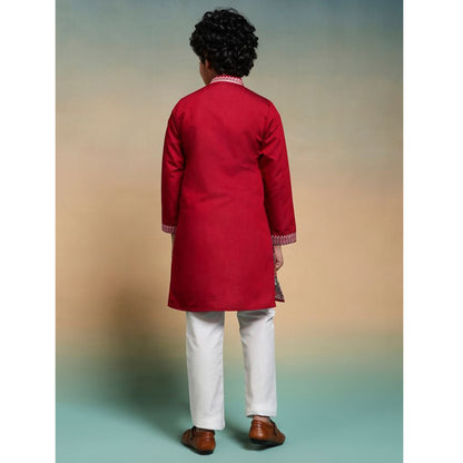 Side profile of red kurta pant set for festive event