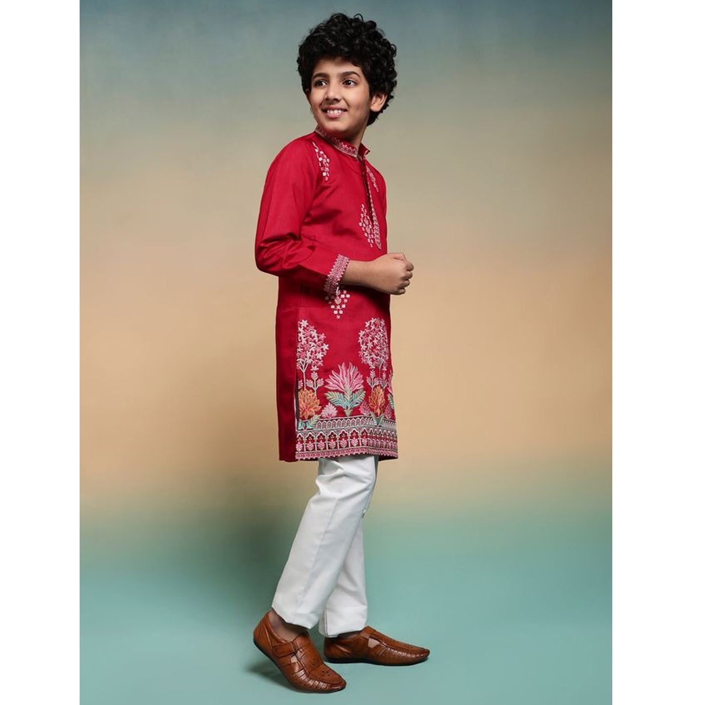 Side profile of red kurta pant set for festive event