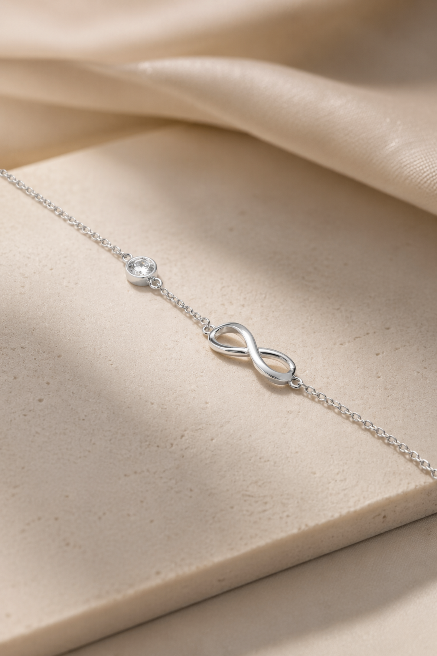 modern silver anklet jewelry detail