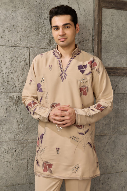 Sequin embroidery detail on a beige men's kurta
