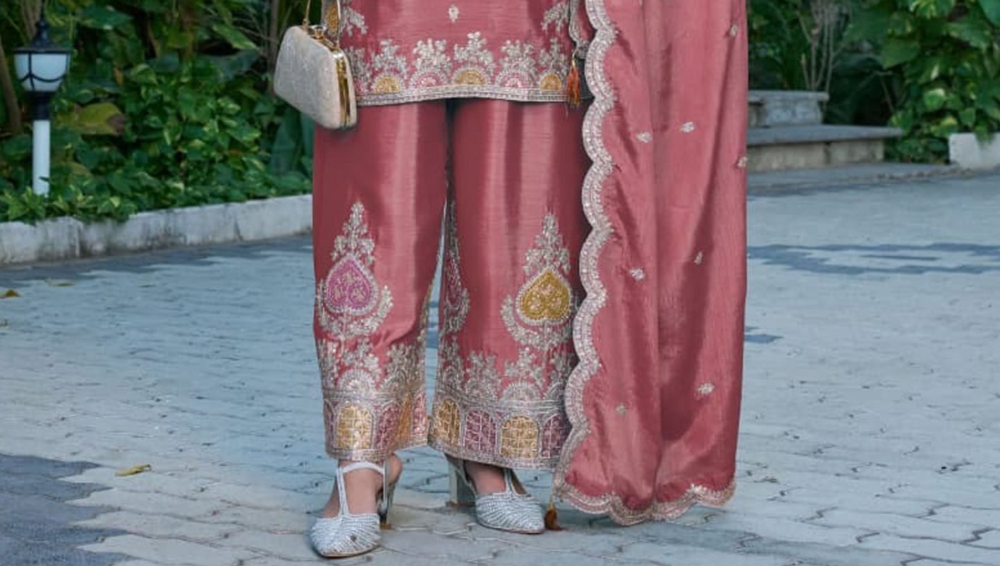 Close-up of Rose gold Palazzo Suit event styling presentation