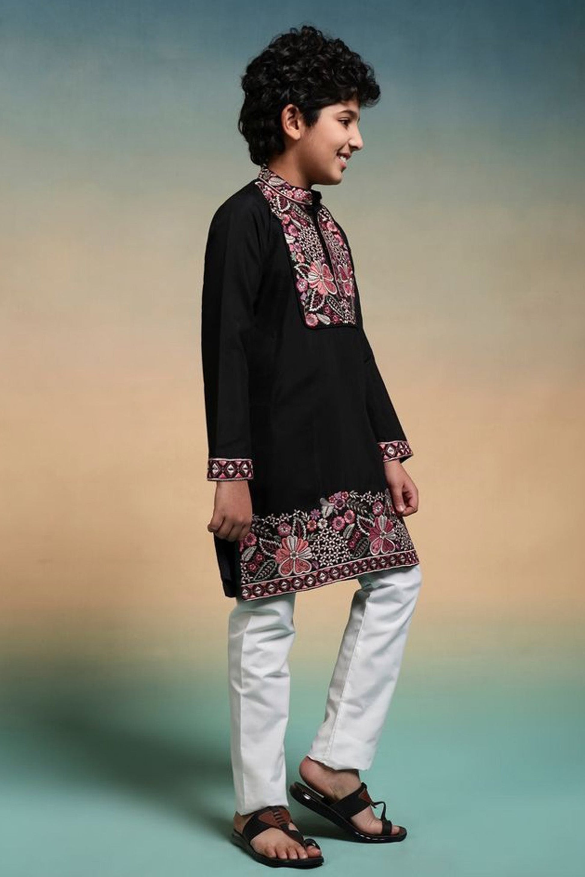 Detailed embroidery pattern on indian kurta for boys