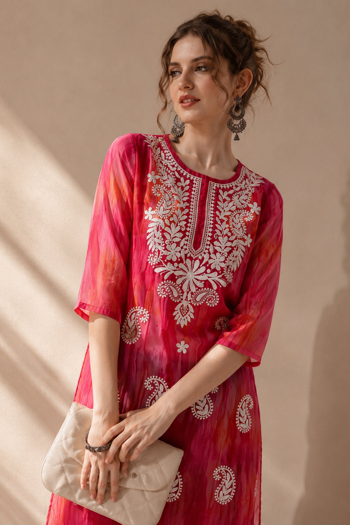 Pink Kurti styled with denim and neutral heels