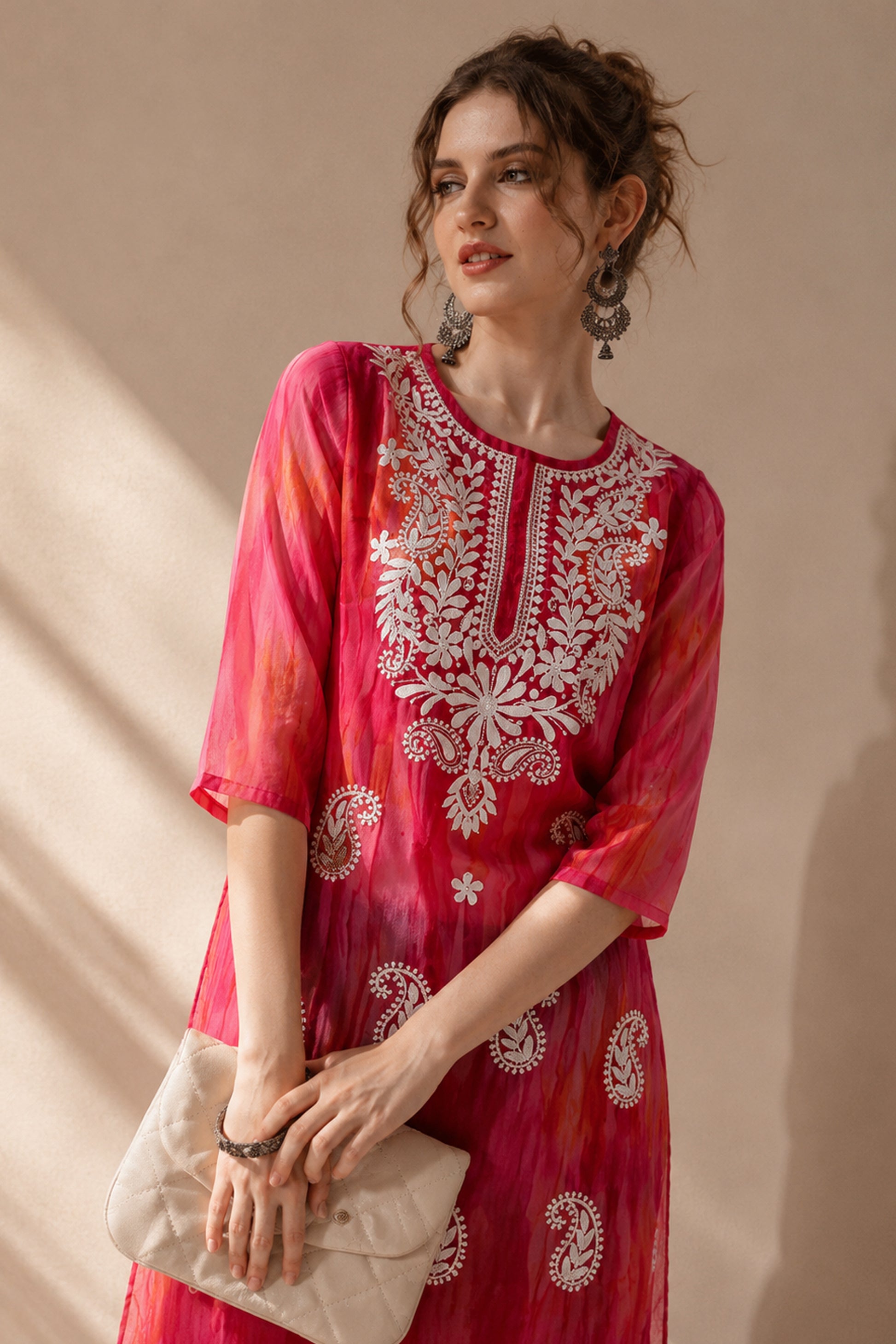 Pink Kurti styled with denim and neutral heels