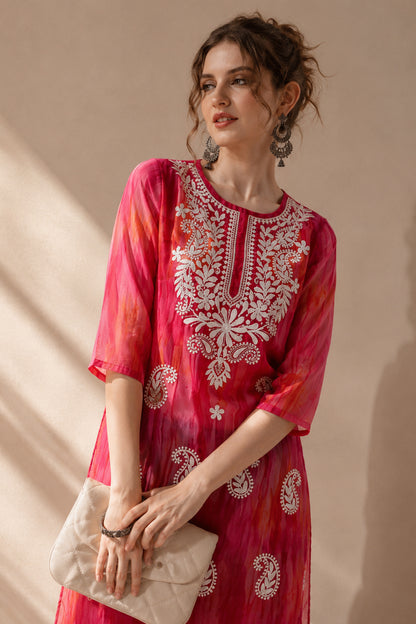Pink Kurti styled with denim and neutral heels