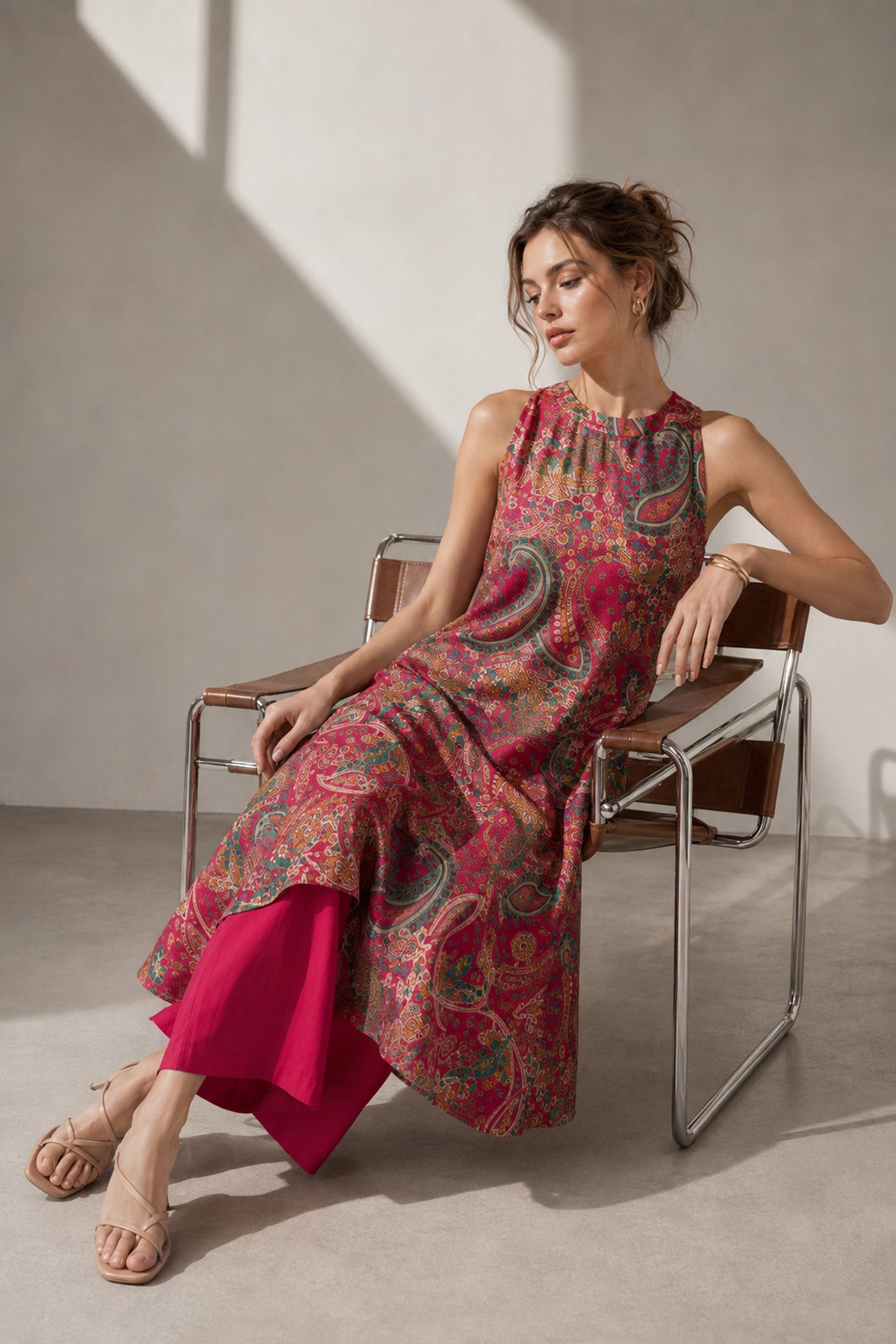 Seated view of the Red printed kurti by Seyuri