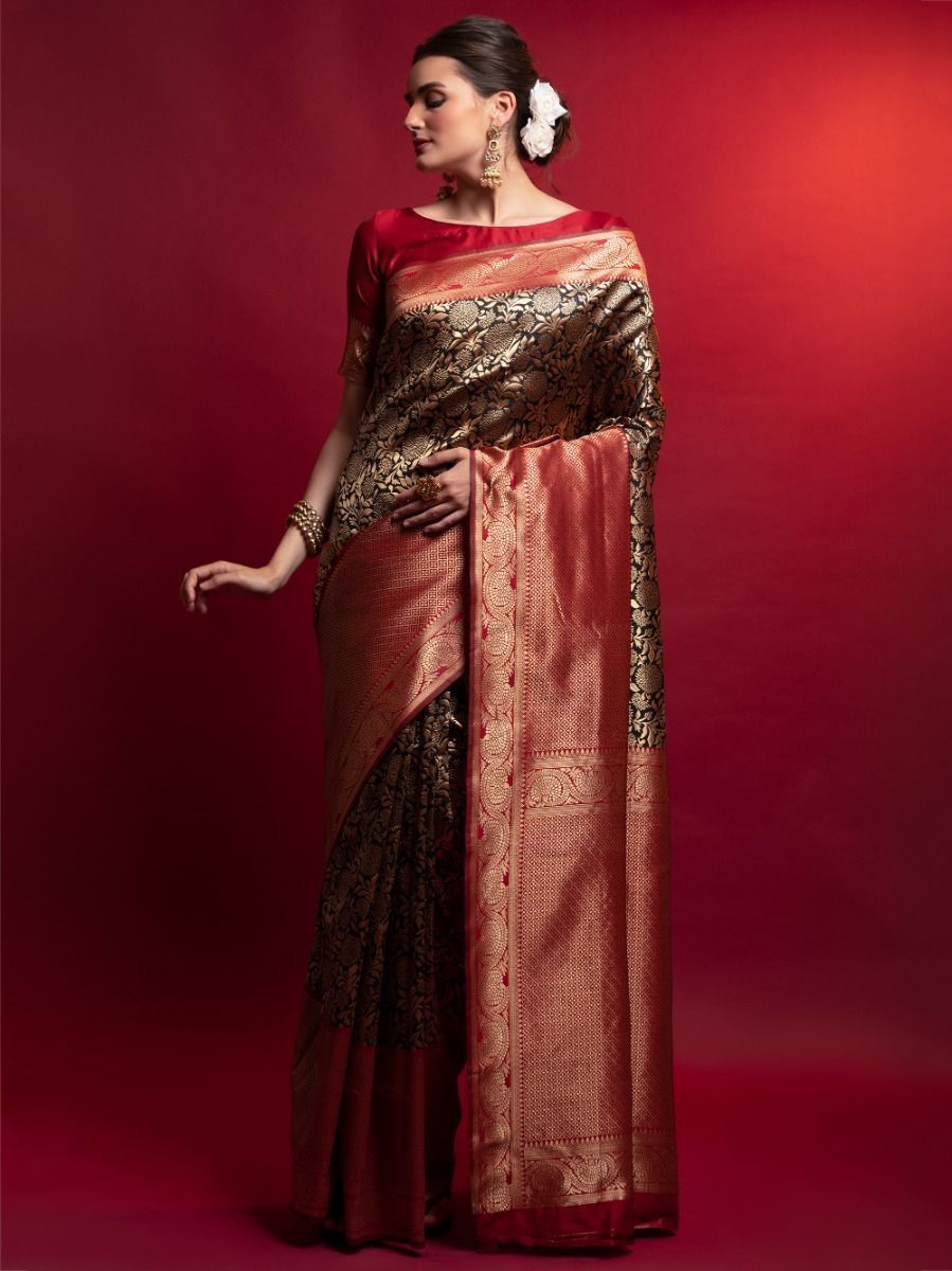 Red Saree speaks tradition and boldness – perfect for weddings and festive nights.

