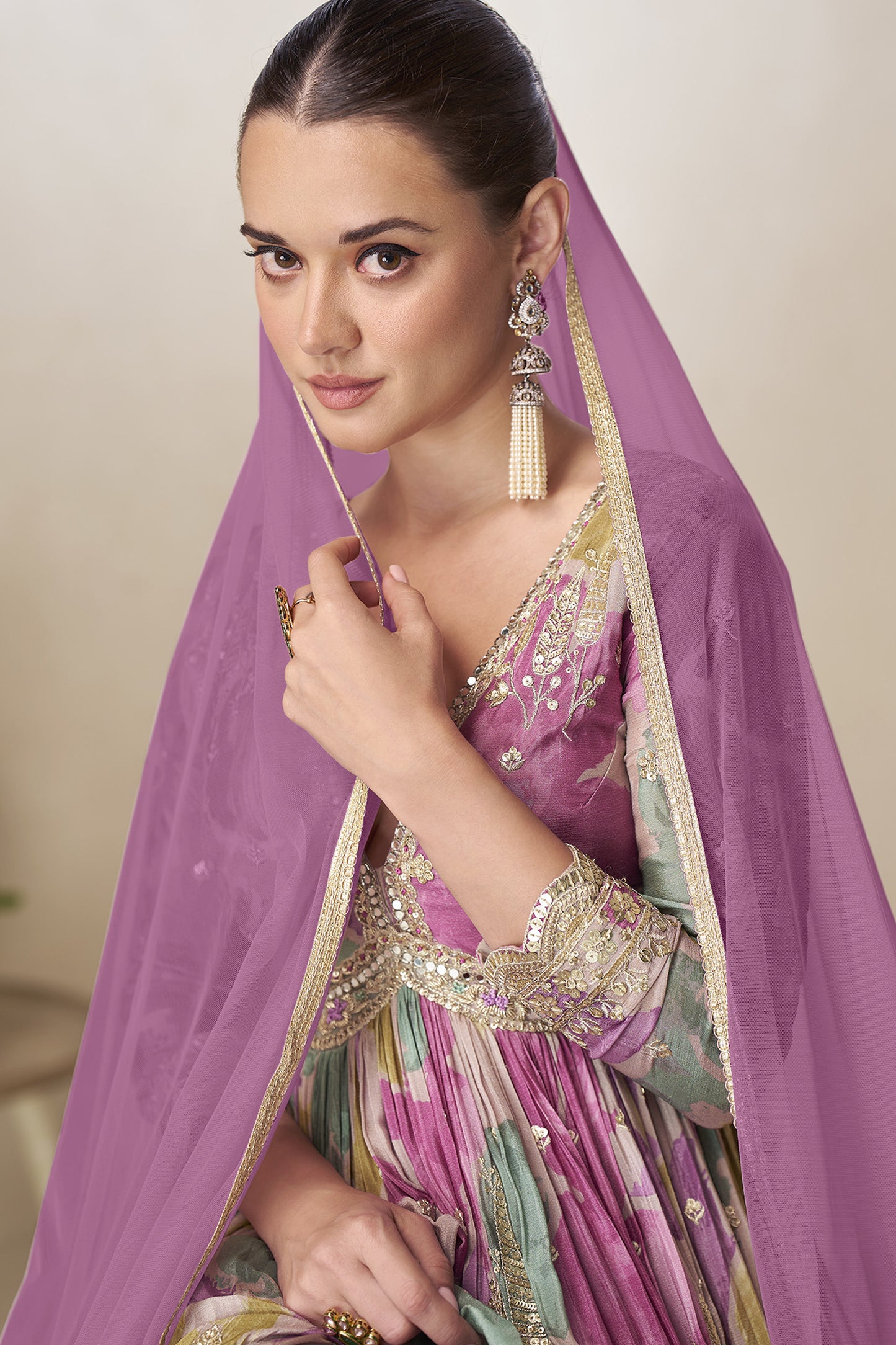 Close up of embroidery work on lavender anarkali gown